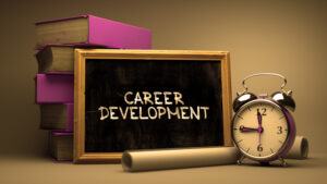 Career Development Handwritten on Chalkboard.